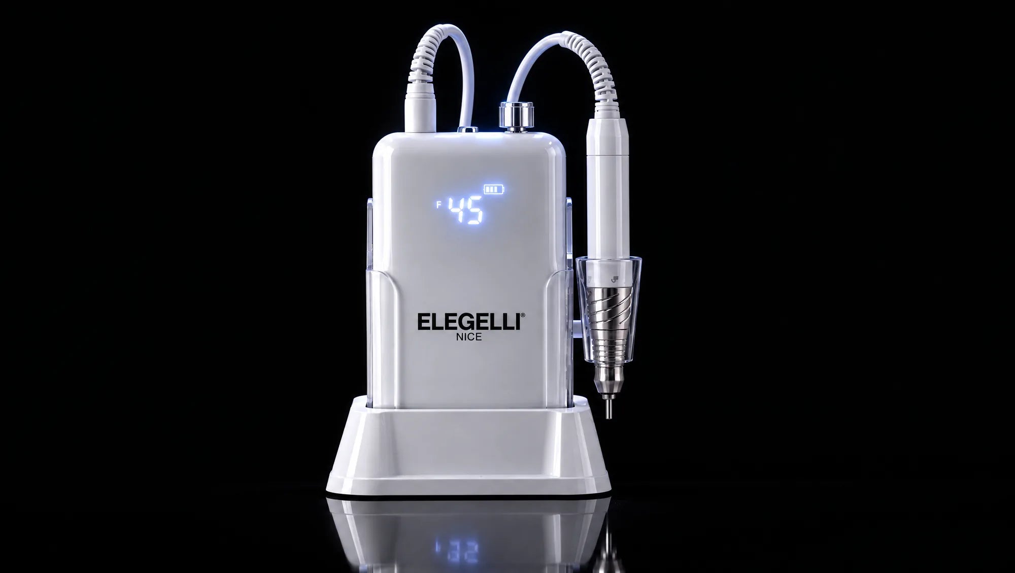 The nail drill docked at night, its display the only light in the room